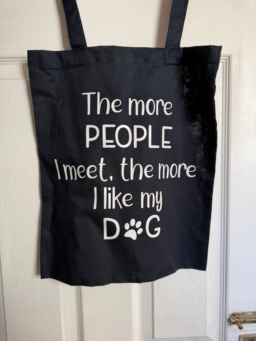 The more people I meet, the more I like my dog - Tote Bag